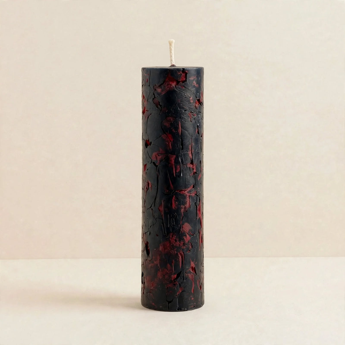 Carmilla handmade Halloween candle by Glowbaltic, hand-poured black rapeseed wax pillar candle with red wax fragments