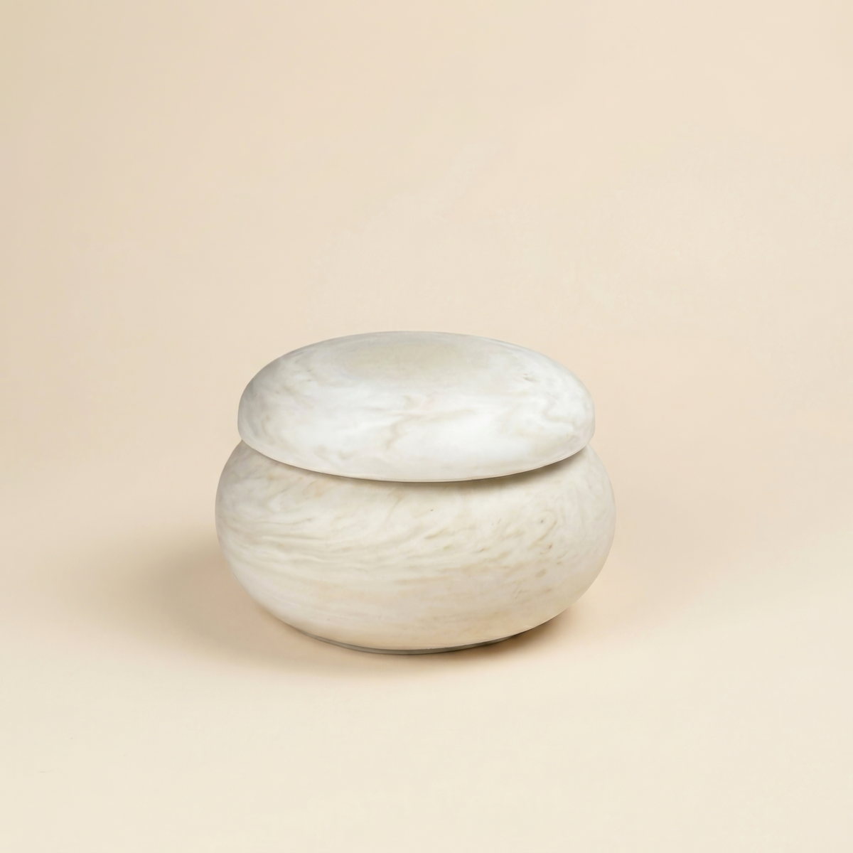 Dome lidded tealight holder in marble beige color, handmade mineral resin by Glowbaltic