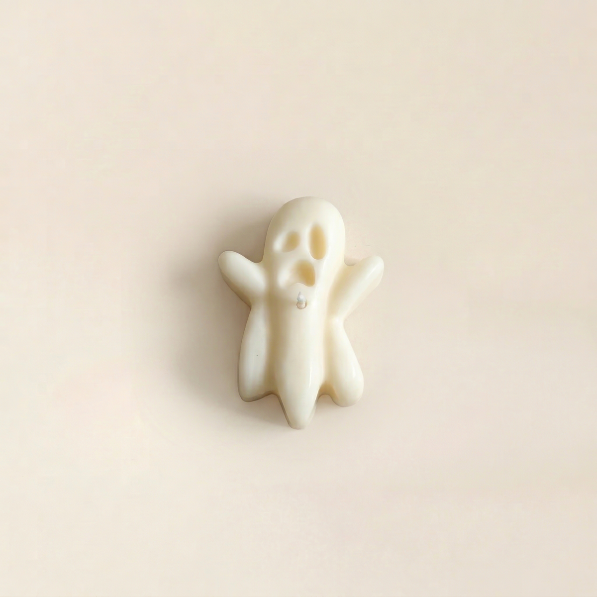 Banshee handmade Halloween candle by Glowbaltic, hand-poured white rapeseed wax ghost candle with raised arms