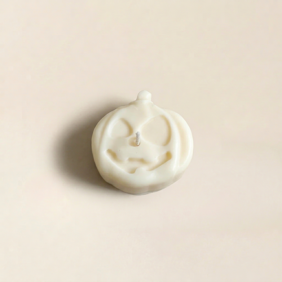 Jack handmade Halloween candle by Glowbaltic, hand-poured white rapeseed wax jack-o'-lantern pumpkin candle