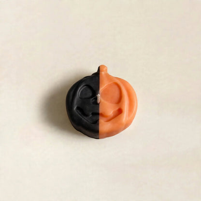 Jack handmade Halloween candle by Glowbaltic, hand-poured black and orange rapeseed wax jack-o'-lantern pumpkin candle