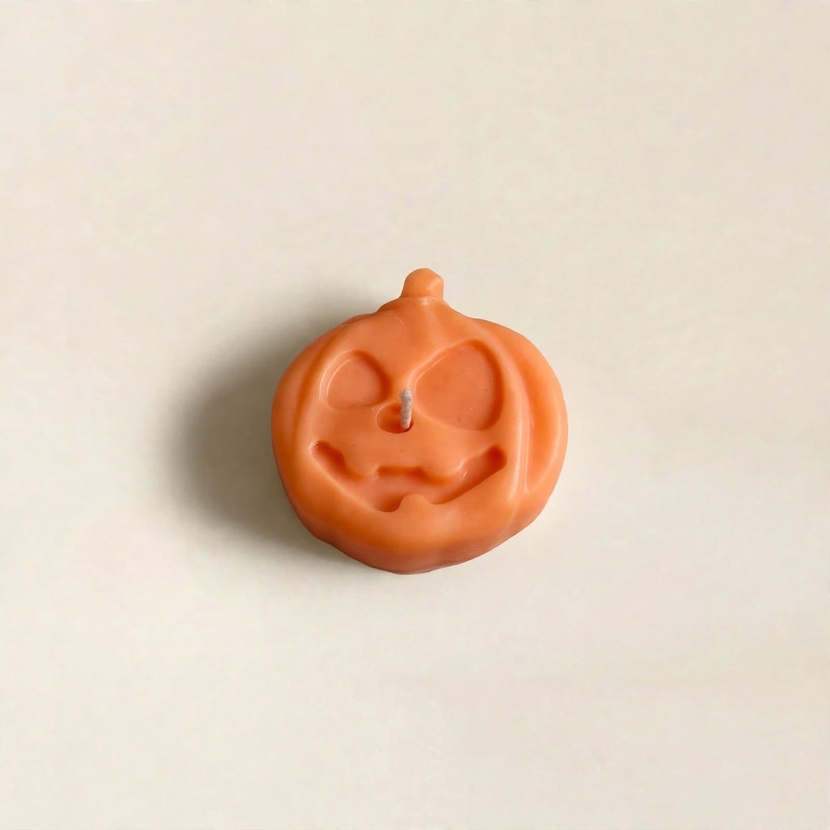 Jack handmade Halloween candle by Glowbaltic, hand-poured orange rapeseed wax jack-o'-lantern pumpkin candle