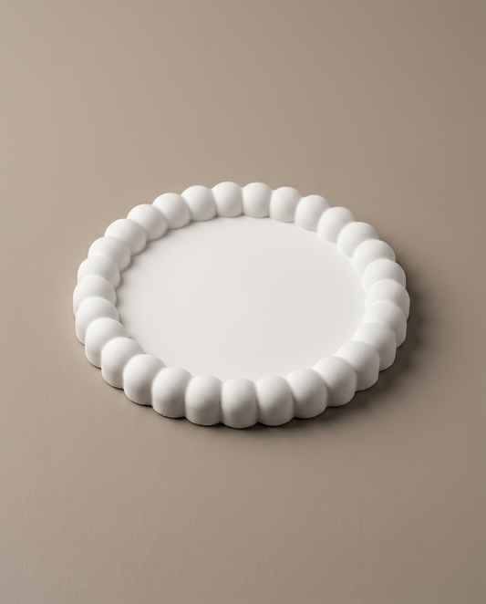 Kera Parl handmade round matte white coaster with bubble-bead edge by GlowBaltic