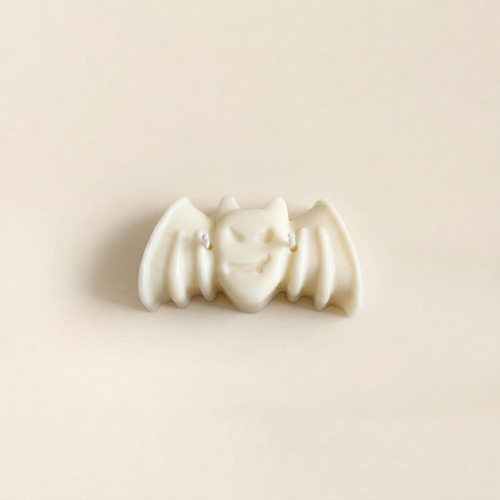 Nox handmade Halloween candle by Glowbaltic, hand-poured white rapeseed wax bat candle with two wicks