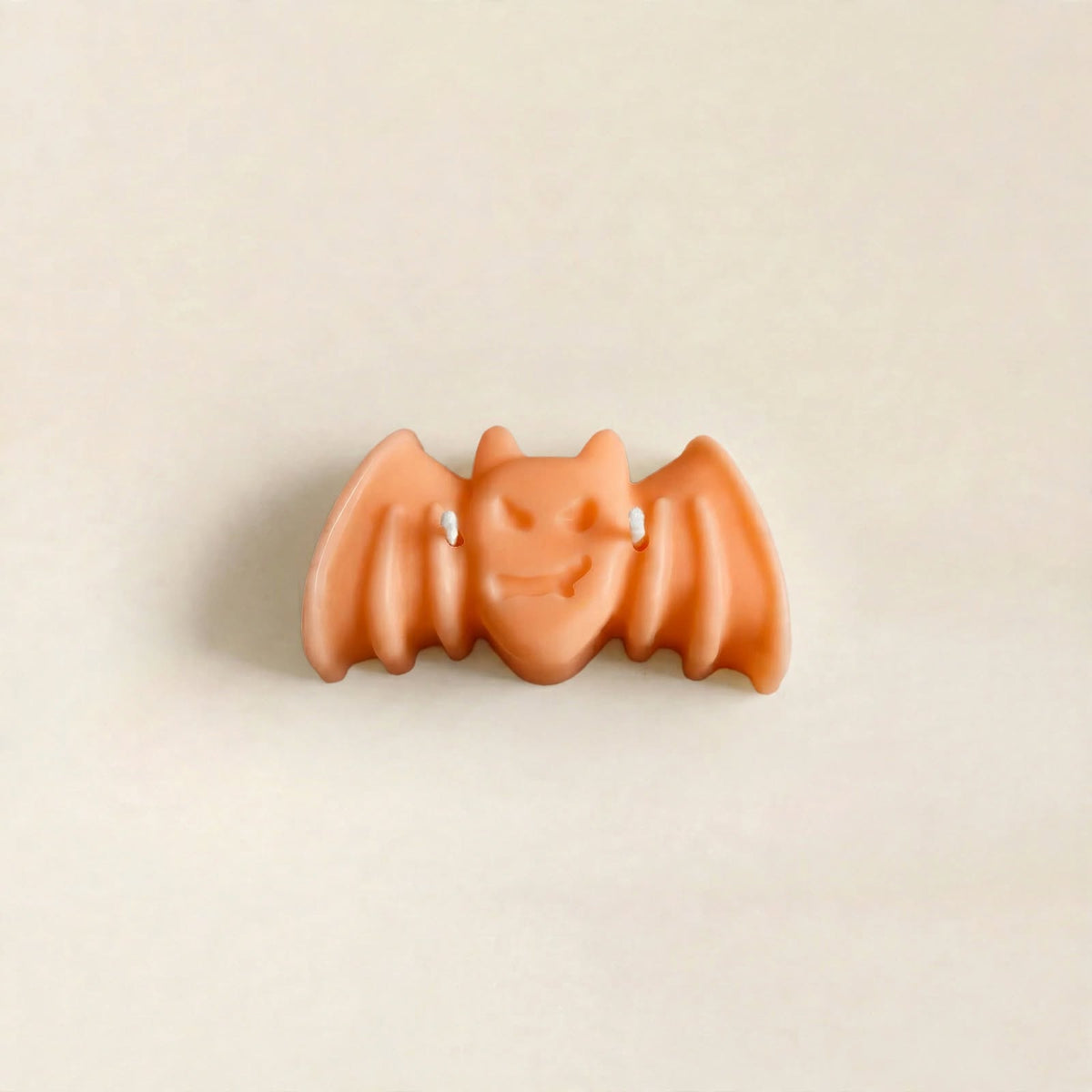 Nox handmade Halloween candle by Glowbaltic, hand-poured orange rapeseed wax bat candle with two wicks