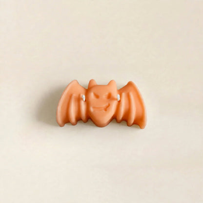Nox handmade Halloween candle by Glowbaltic, hand-poured orange rapeseed wax bat candle with two wicks
