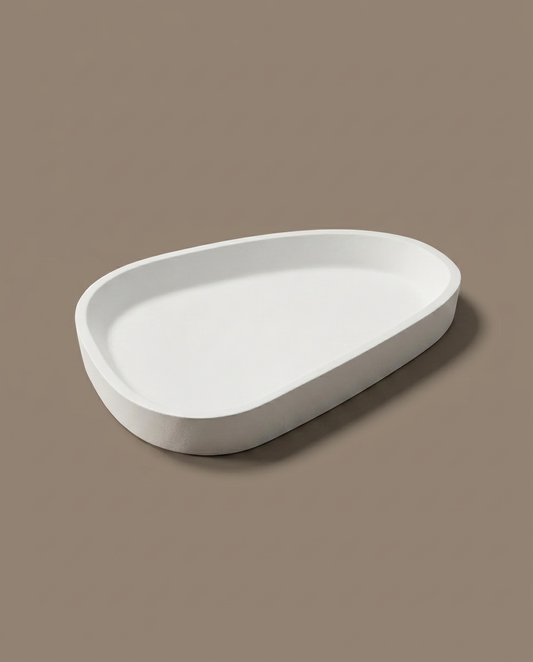 Olis handmade pebble-shaped matte white trinket tray by GlowBaltic