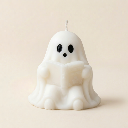 Handmade Storytime ghost candle for halloween by Glowbaltic reading Ghost Stories book